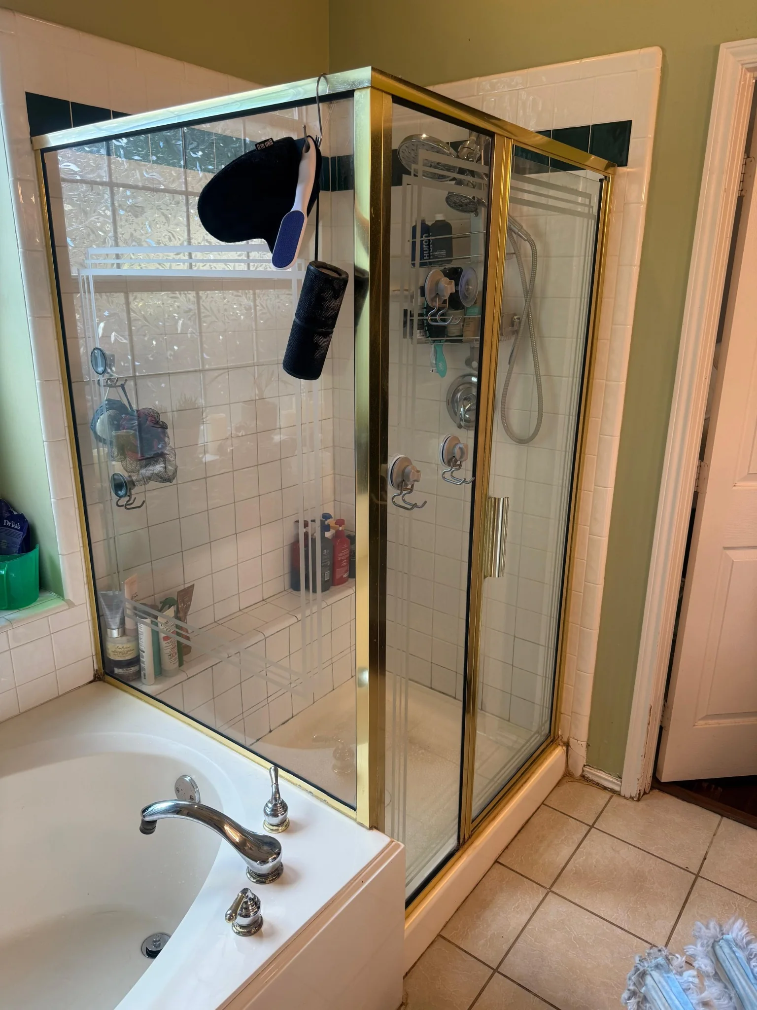 Clean shower with gold trim