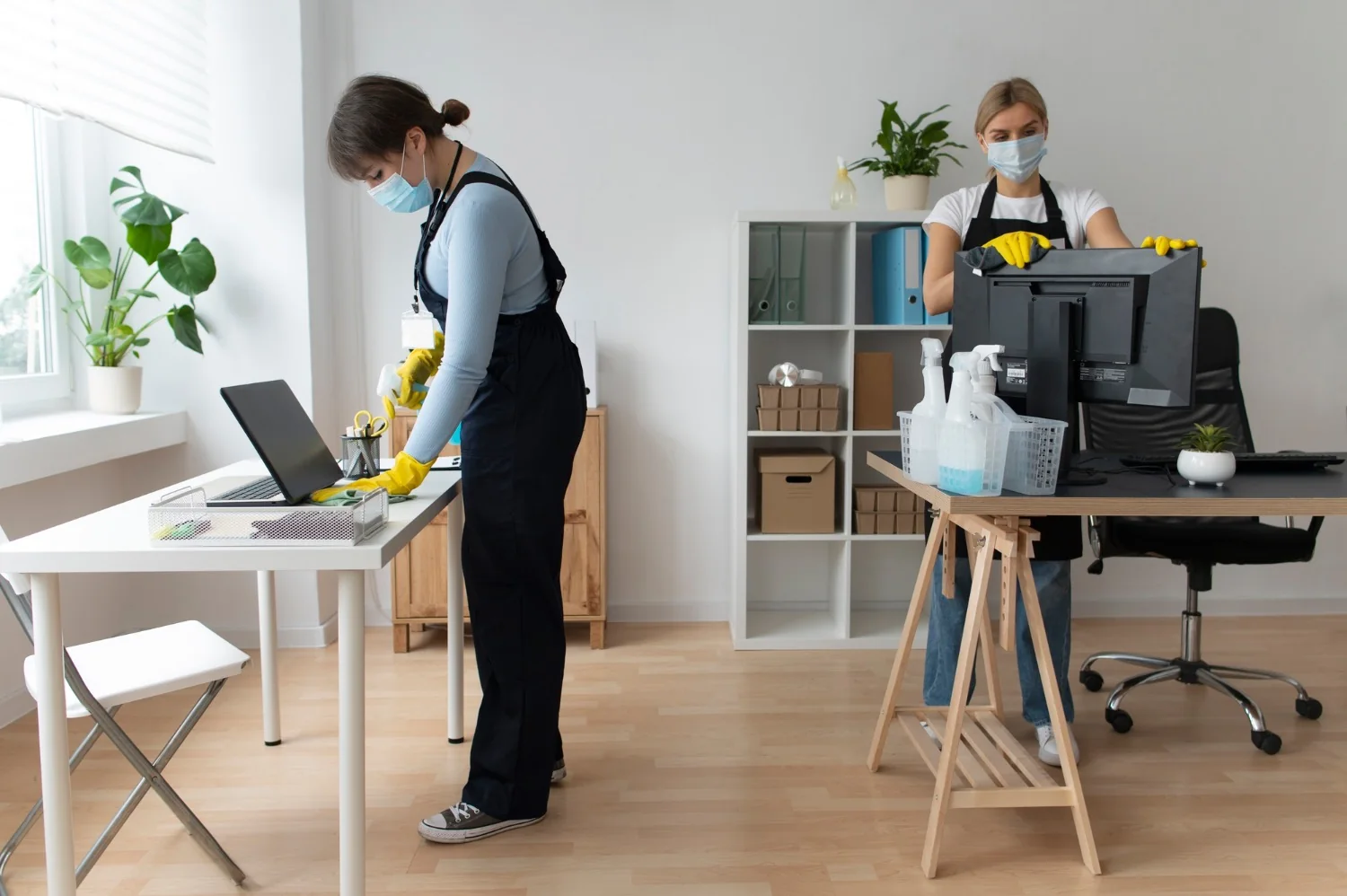 Commercial cleaning team preparing and cleaning an office